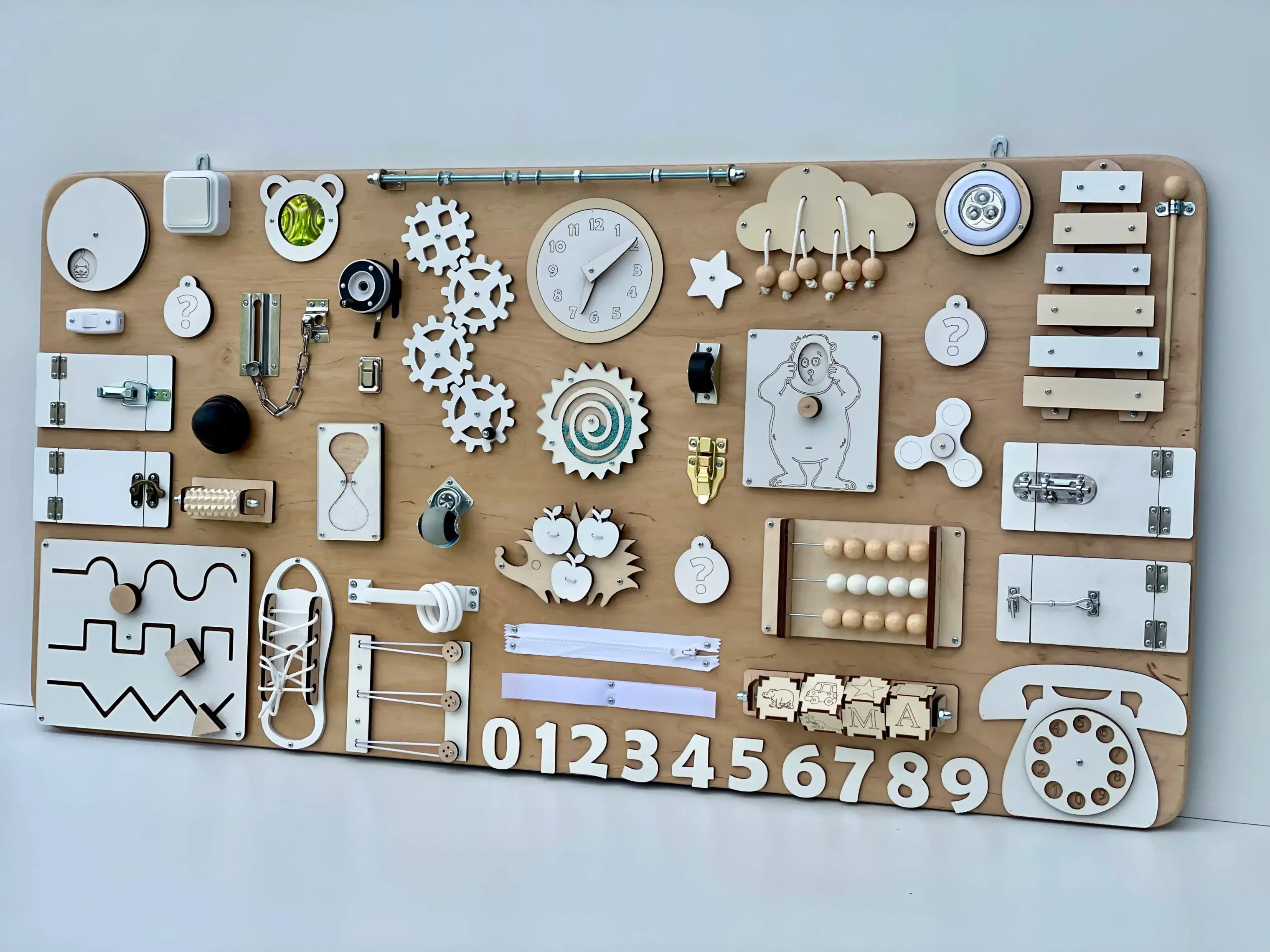 Бізіборд 120×60 см у світлих пастельних кольорах – дерев’яна розвиваюча дошка для дітей