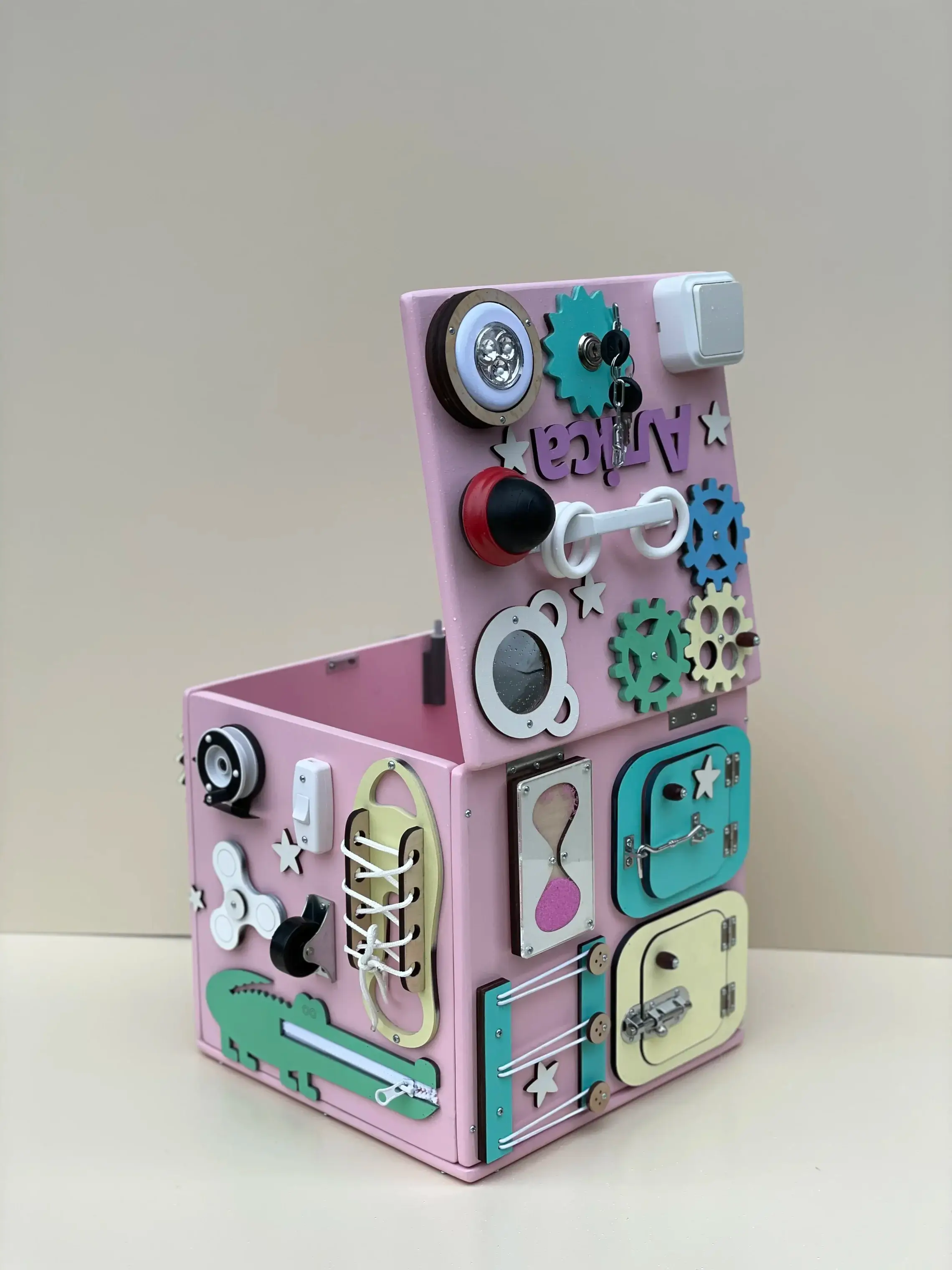 Бізітумба 30 см у рожевих кольорах – розвиваюча тумба для дівчинки