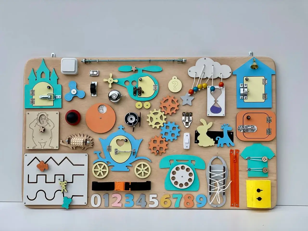 Бізіборд 100×60 см – інтерактивна розвиваюча дошка для дітей | Busyboard.shop